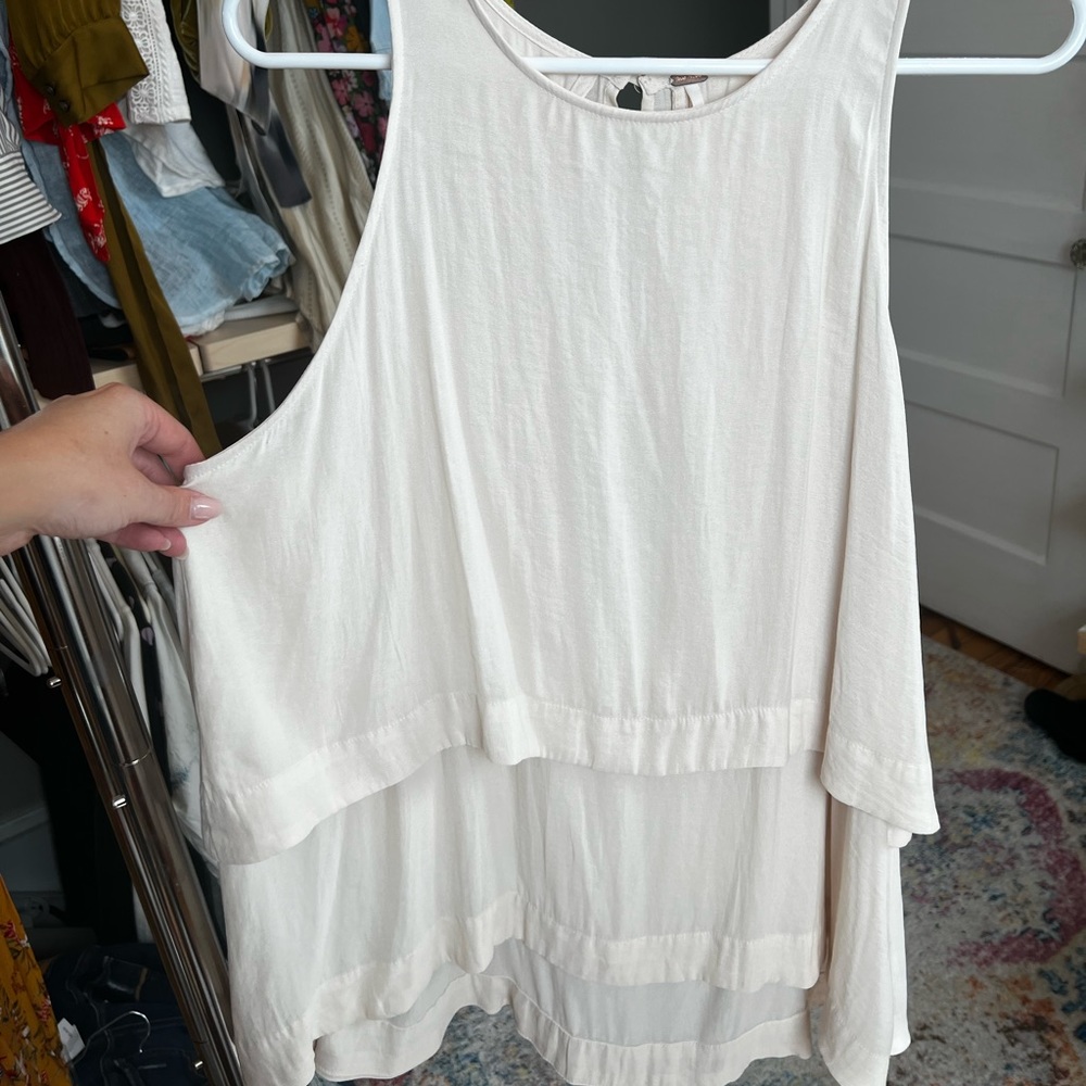 Free People size M cream flowy tank top.